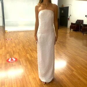 Handmade white long dress with hand sewn pearls. Has zipper on the back. Size s